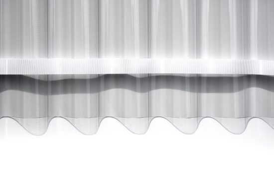 Elegant white curtain drapery texture background for interior design presentations, mockup graphics, and creative templates.